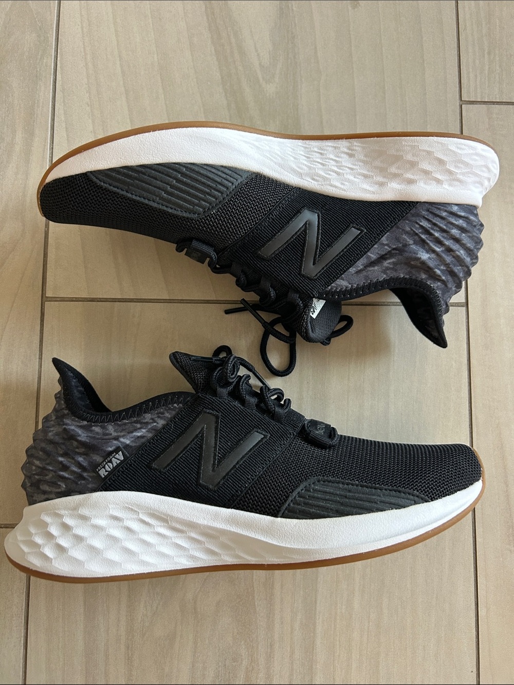 New Balance Men's Black and White Athletic Sneakers with Gum Outsole